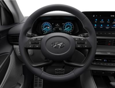 The sporty 4-spoke steering wheel inside of the all-new Hyundai BAYON compact crossover SUV.