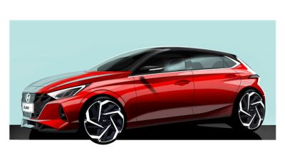 Štúdia nového modelu Hyundai i20 červenej farby na zelenom pozadí, pohľad zo strany vodiča