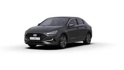 Front side view of the new Hyundai i30 Fastback in the colour Dark Knight.