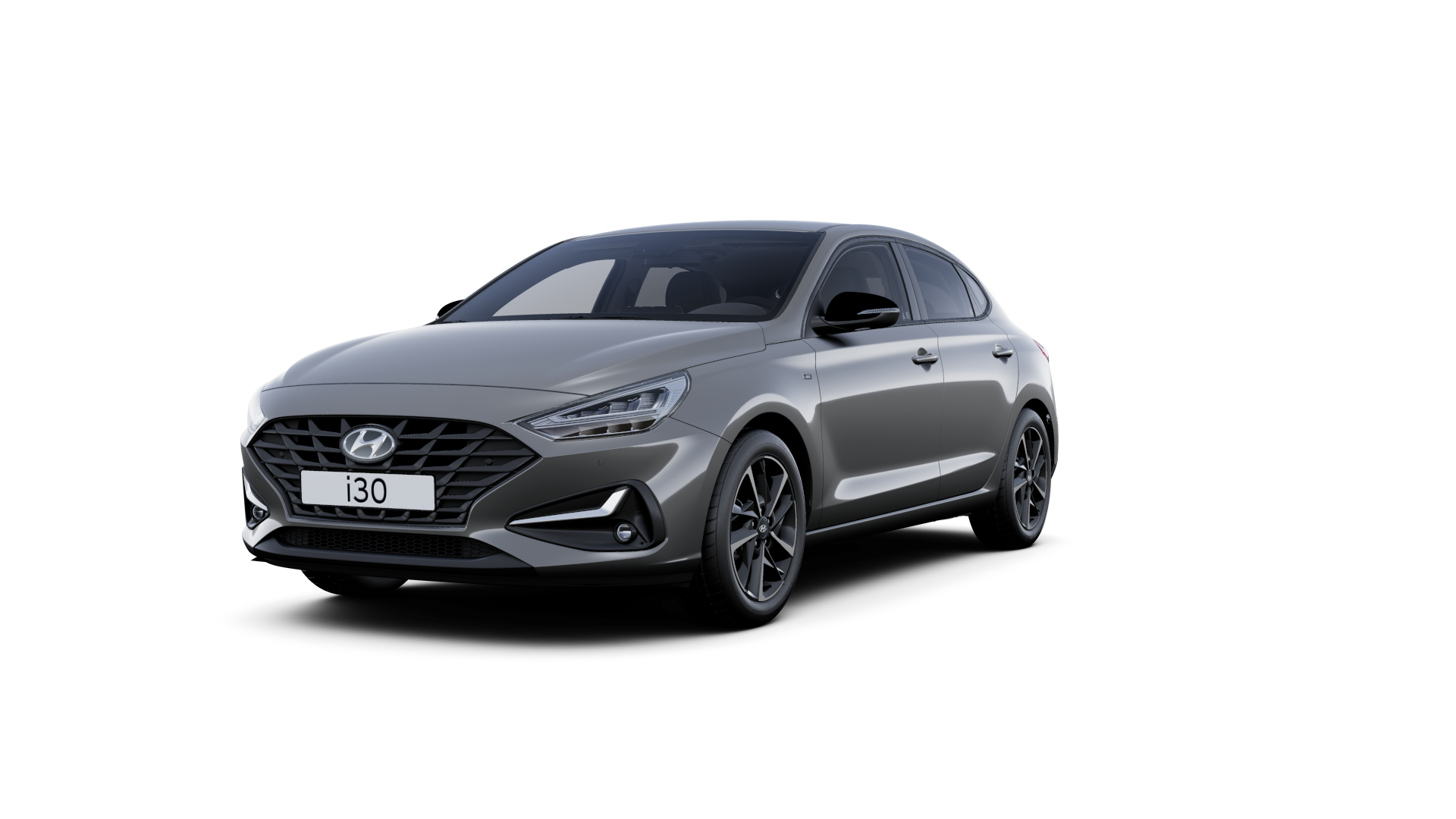 Front side view of the new Hyundai i30 Fastback in the colour Amazon Grey.