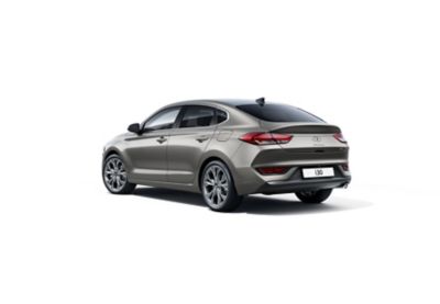 The new Hyundai i30 Fastback pictured from the driver side rear.