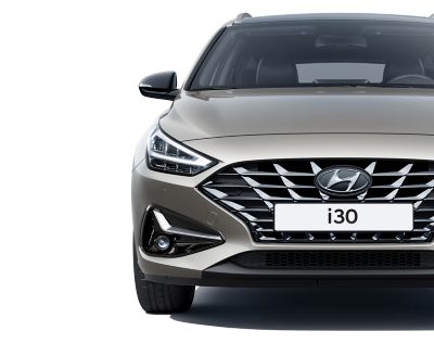 The new Hyundai i30 Wagon pictured from the front, focused on the headlamp