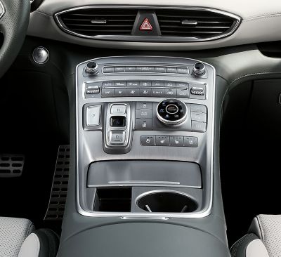 An interior view of the centre console of the new Hyundai SANTA FE Plug-in Hybrid 7 seat SUV.