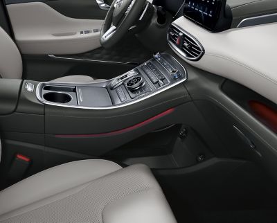The new Hyundai SANTA FE Plug-in Hybrid SUV and its tray under the centre console.