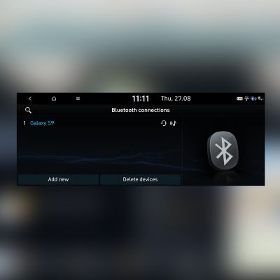 Detailný pohľad na dotykovú obrazovku v modeli Hyundai s pripojenými zariadeniami Bluetooth.